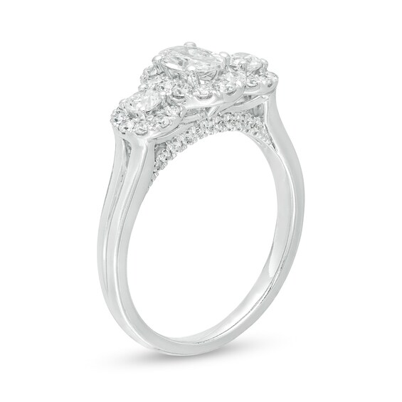 Celebration Ideal 1 CT. T.w. Oval Certified Diamond Frame Three Stone Engagement Ring in 14K White Gold (I/I1)