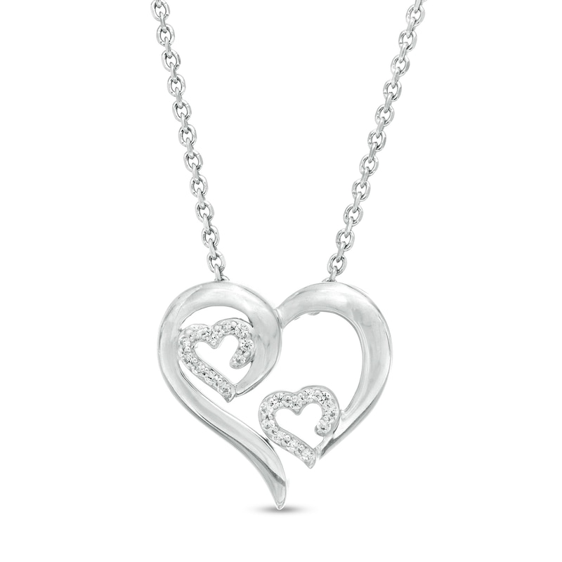 1/10 CT. T.W. Diamond Triple Swirl Heart Pendant in Sterling Silver