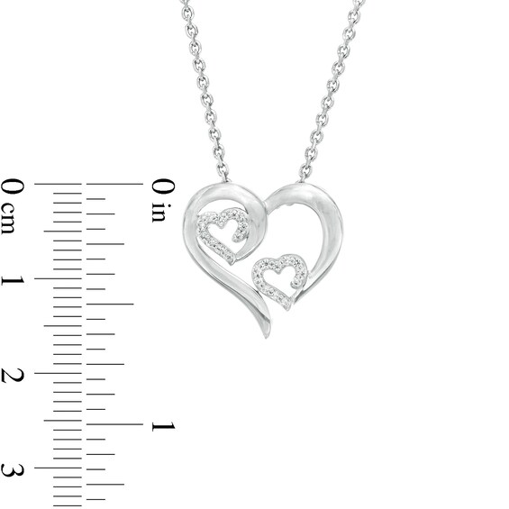 1/10 CT. T.w. Diamond Triple Swirl Heart Pendant in Sterling Silver