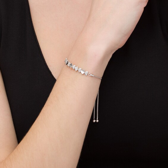 1/3 CT. T.W. Diamond Sideways Heart Bolo Bracelet in Sterling Silver - 9.5" 1/3 CT. T.W. Diamond Sideways Heart Bolo Bracelet in Sterling Silver - 9.5"