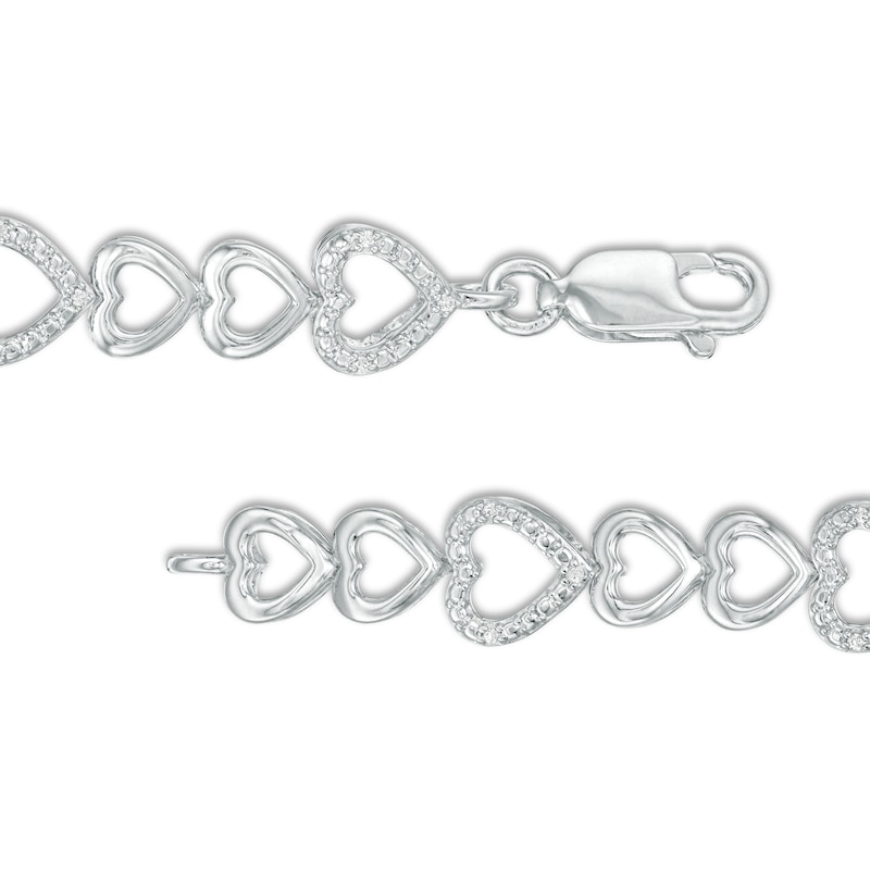 1/15 CT. T.W. Diamond Sideways Heart Link Bracelet in Sterling Silver - 7.5"