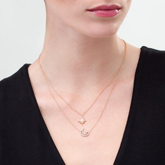 1/15 CT. T.w. Diamond Double Strand Star and Moon Necklace in Sterling Silver with 10K Rose Gold Plate