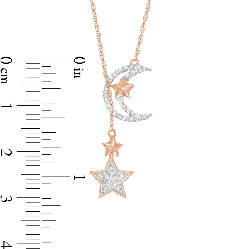 1/15 CT. T.W. Diamond Star and Moon Drop Necklace in Sterling Silver with 10K Rose Gold Plate