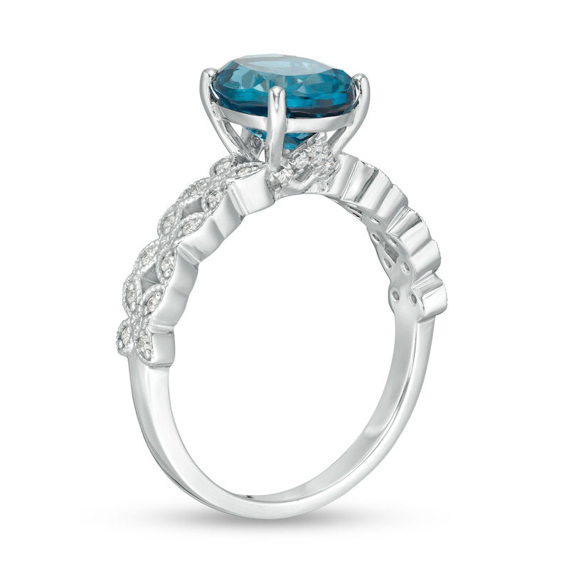 Oval London Blue Topaz and 1/8 CT. T.W. Diamond Vintage-Style Engagement Ring in 14K White Gold