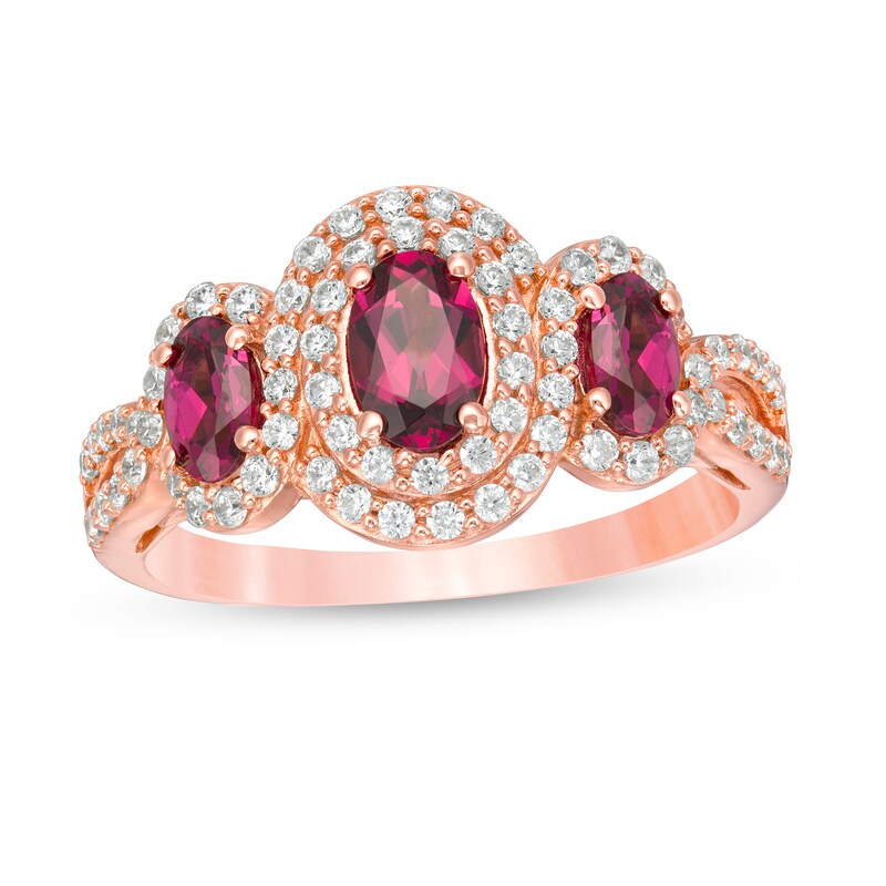 Main Image 1 of Oval Rhodolite Garnet and 1/2 CT. T.W. Diamond Frame Three Stone Engagement Ring in 14K Rose Gold