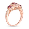 Thumbnail Image 3 of Oval Rhodolite Garnet and 1/2 CT. T.W. Diamond Frame Three Stone Engagement Ring in 14K Rose Gold