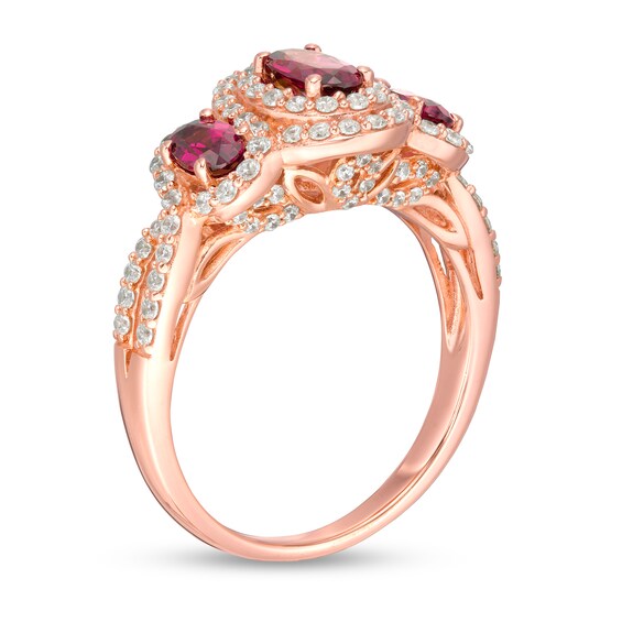 Oval Rhodolite Garnet and 1/2 CT. T.w. Diamond Frame Three Stone Engagement Ring in 14K Rose Gold