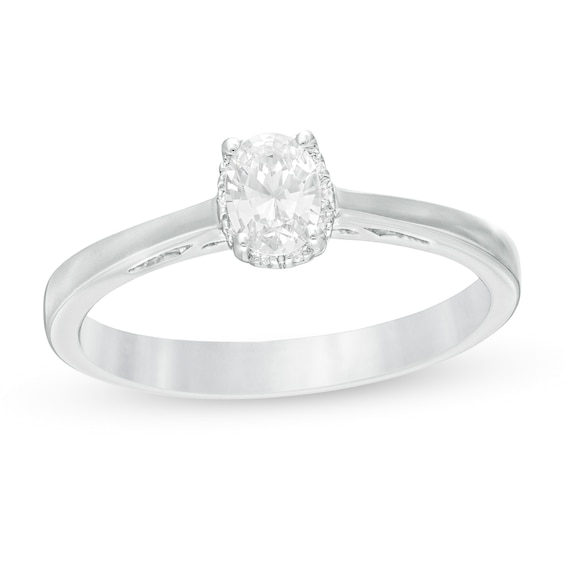 Celebration Ideal 1/3 CT. T.w. Oval Certified Diamond Frame Engagement Ring in 14K White Gold (I/I1)