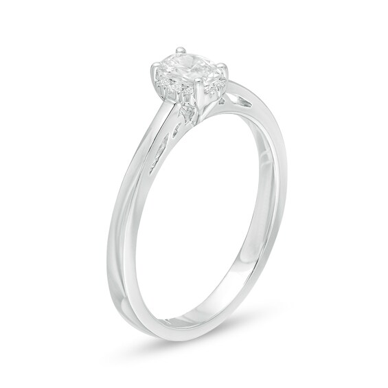 Celebration Ideal 1/3 CT. T.w. Oval Certified Diamond Frame Engagement Ring in 14K White Gold (I/I1)
