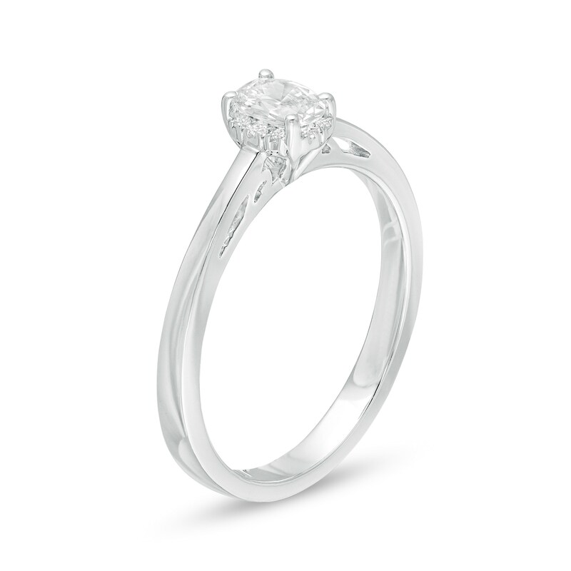 Main Image 3 of Celebration Ideal 1/3 CT. T.W. Oval Certified Diamond Frame Engagement Ring in 14K White Gold (I/I1)