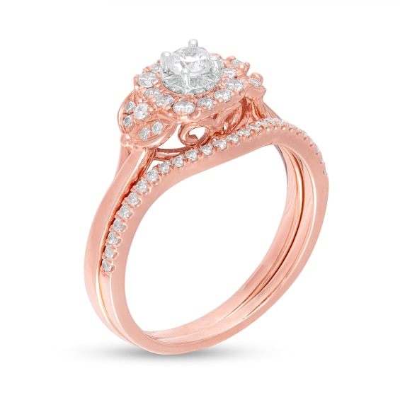 1/2 CT. T.W. Diamond Cushion Frame Collar Bridal Set in 10K Rose Gold 1/2 CT. T.W. Diamond Cushion Frame Collar Bridal Set in 10K Rose Gold
