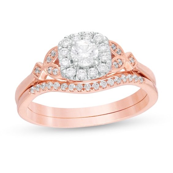 1/2 CT. T.w. Diamond Cushion Frame Leaf-Sides Bridal Set in 10K Rose Gold