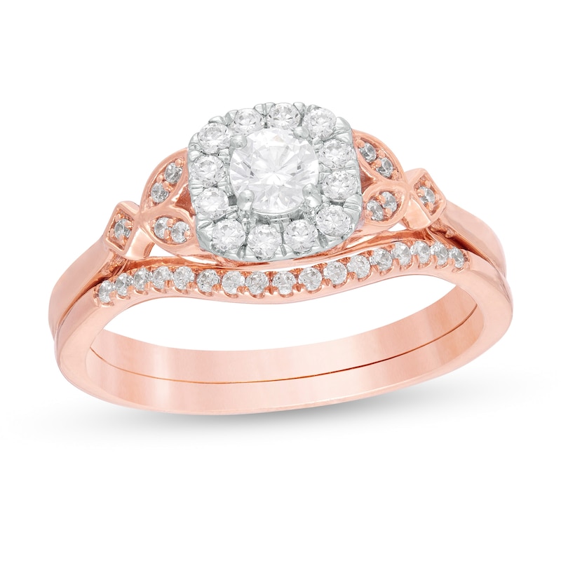Main Image 1 of 1/2 CT. T.W. Diamond Cushion Frame Leaf-Sides Bridal Set in 10K Rose Gold