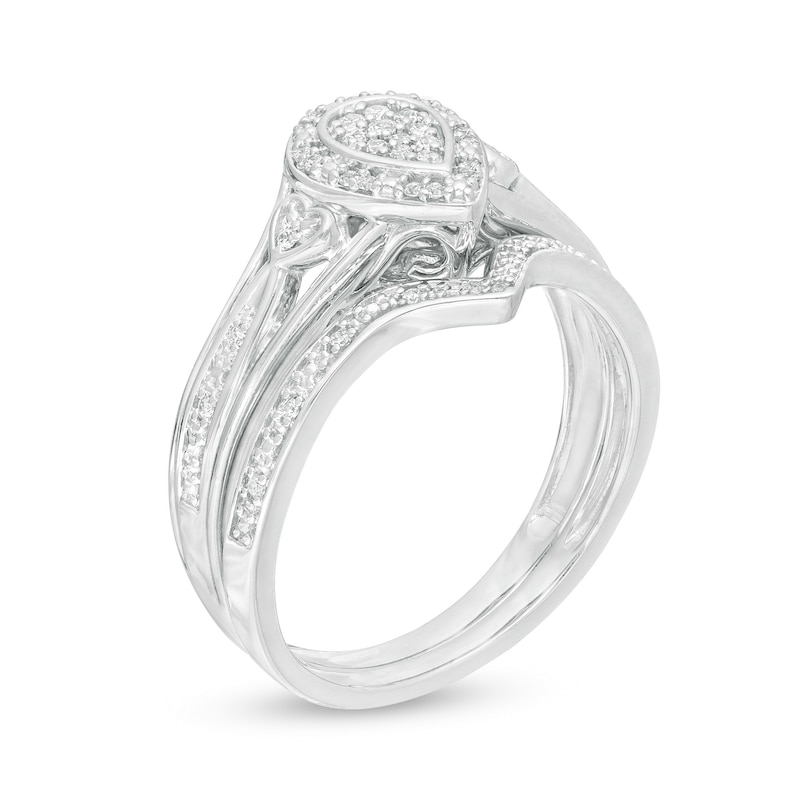 1/6 CT. T.W. Composite Diamond Pear-Shaped Frame Heart-Sides Bridal Set in Sterling Silver