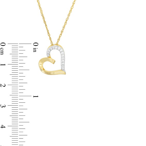 1/10 CT. T.w. Diamond Tilted Ribbon Heart Pendant in 10K Gold