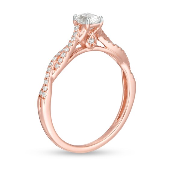 1/2 CT. T.w. Emerald-Cut Diamond Twist Shank Engagement Ring in 14K Rose Gold