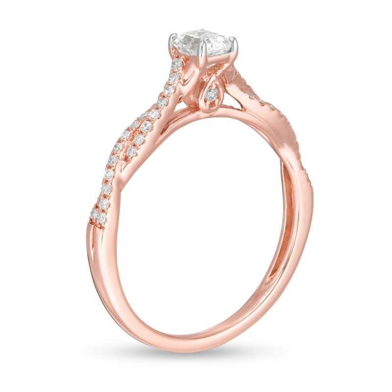 1/2 CT. T.W. Emerald-Cut Diamond Twist Shank Engagement Ring in 14K Rose Gold