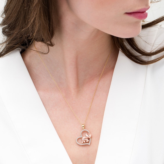 1/10 CT. T.w. Enhanced Blue and White Diamond Elephant and Heart Pendant in Sterling Silver and 14K Two-Tone Gold Plate