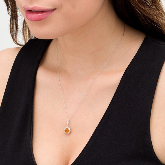 7.0mm Madeira Citrine, White Topaz and 1/20 CT. T.W. Diamond Sunburst Frame Drop Pendant in 10K White Gold 7.0mm Madeira Citrine, White Topaz and 1/20 CT. T.W. Diamond Sunburst Frame Drop Pendant in 10K White Gold