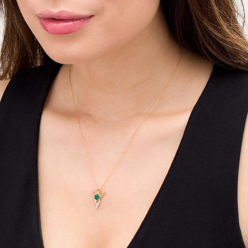 Main Image 2 of 5.0mm Heart-Shaped Lab-Created Emerald and 1/20 CT. T.W. Diamond Angel Pendant in 10K Gold