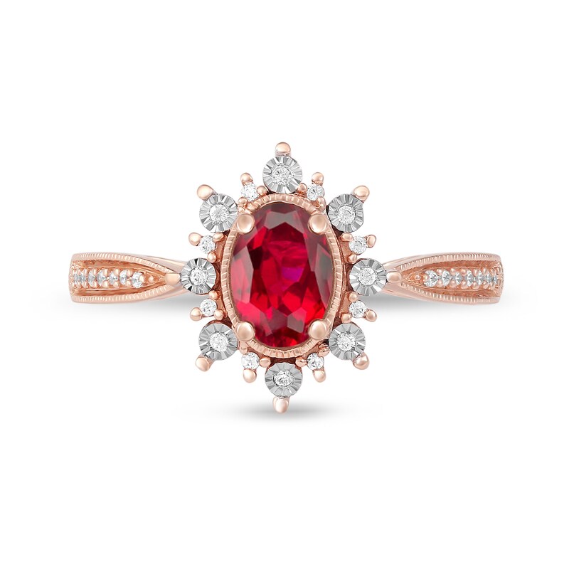 Oval Ruby and 1/10 CT. T.W. Diamond Sunburst Frame Vintage-Style Tapered Shank Ring in 10K Rose Gold