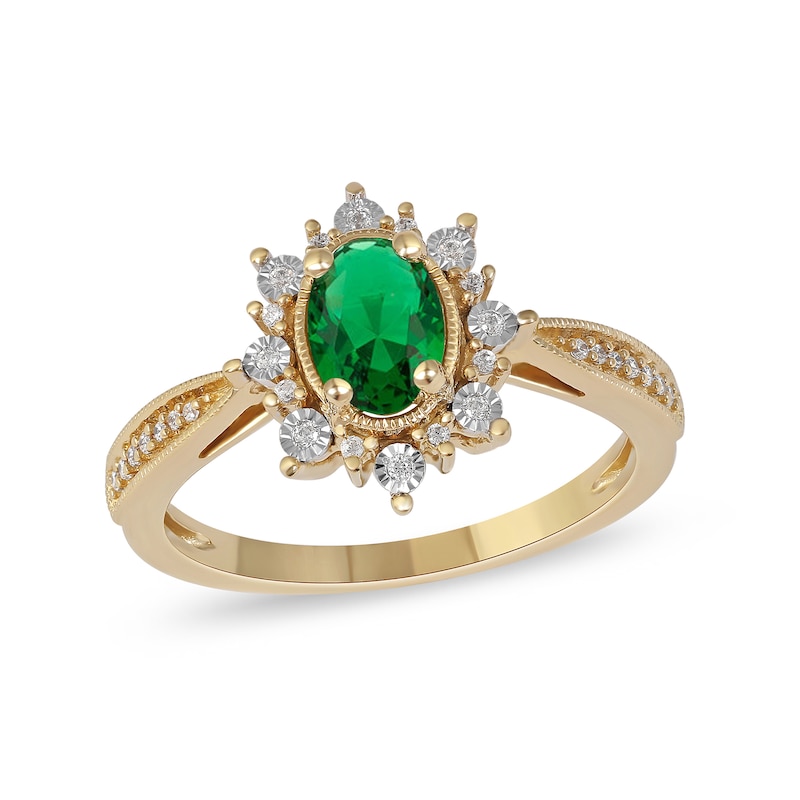 Oval Emerald and 1/10 CT. T.W. Diamond Sunburst Frame Vintage-Style Tapered Shank Ring in 10K Gold