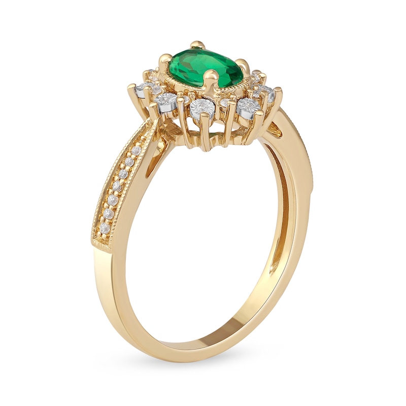 Oval Emerald and 1/10 CT. T.W. Diamond Sunburst Frame Vintage-Style Tapered Shank Ring in 10K Gold