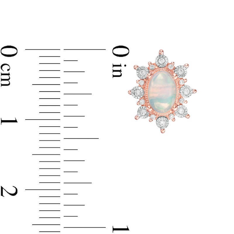 Main Image 3 of Oval Opal and 1/8 CT. T.W. Diamond Starburst Frame Vintage-Style Stud Earrings in 10K Rose Gold