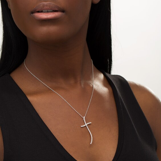1/3 CT. T.w. Diamond Curvy Cross Pendant in Sterling Silver