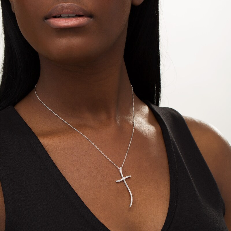 Main Image 2 of 1/3 CT. T.W. Diamond Curvy Cross Pendant in Sterling Silver
