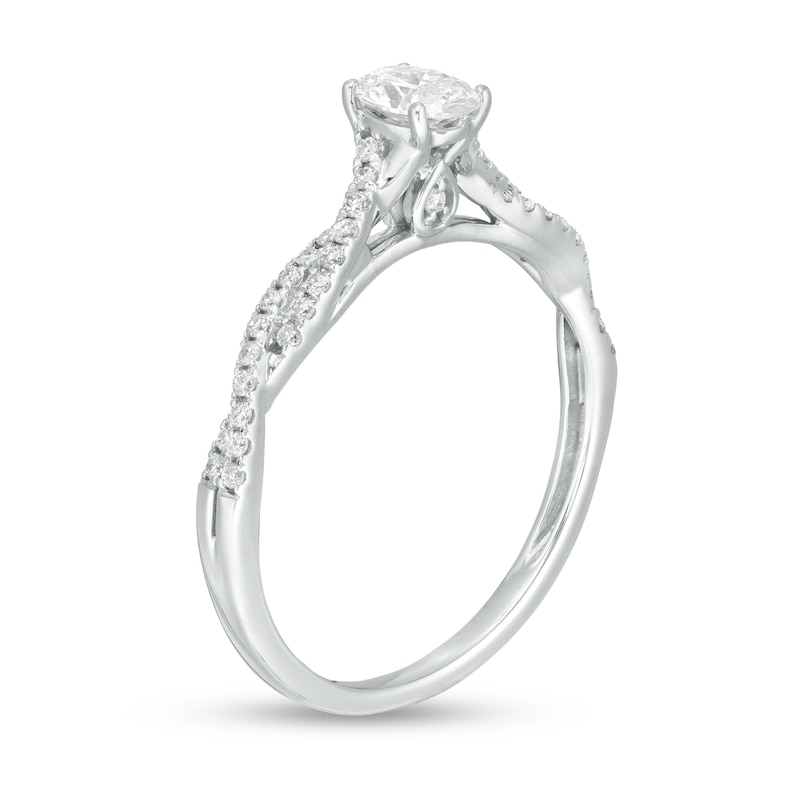 Main Image 3 of 1/2 CT. T.W. Oval Diamond Twist Engagement Ring in 14K White Gold