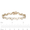 Thumbnail Image 3 of 1/4 CT. T.W. Diamond Infinity Link Bracelet in 10K Gold