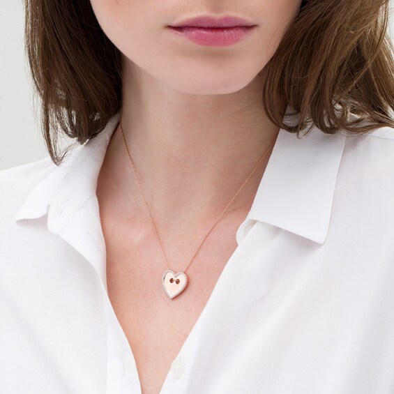 1/6 CT. T.W. Diamond Heart-Shaped Button Pendant in Sterling Silver with 14K Rose Gold Plate 1/6 CT. T.W. Diamond Heart-Shaped Button Pendant in Sterling Silver with 14K Rose Gold Plate