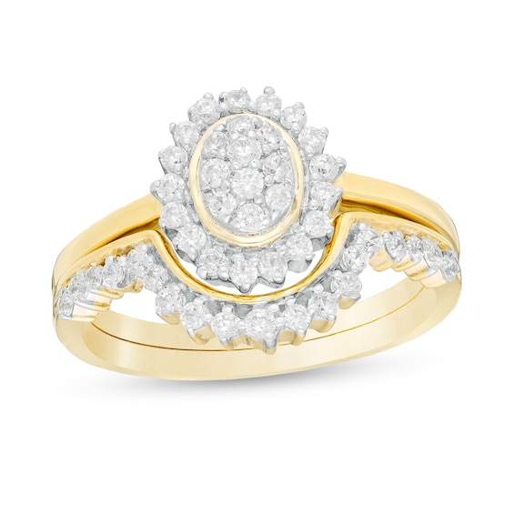 1/2 CT. T.W. Composite Oval Diamond Frame Sunburst Bridal Set in 10K Gold 1/2 CT. T.W. Composite Oval Diamond Frame Sunburst Bridal Set in 10K Gold
