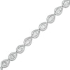 Thumbnail Image 0 of 1/10 CT. T.W. Diamond Teardrop Link Bracelet in Sterling Silver - 7.5"