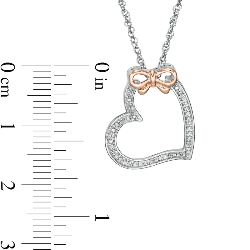 Main Image 3 of 1/20 CT. T.W. Diamond Tilted Heart with Bow Pendant in Sterling Silver and 10K Rose Gold