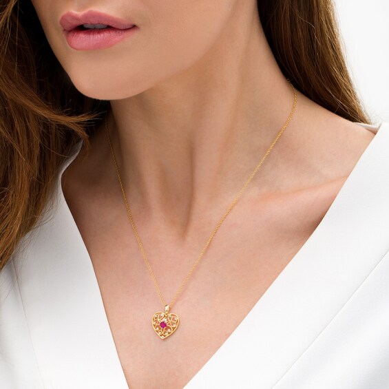 4.0mm Lab-Created Ruby and 1/20 CT. T.W. Diamond Filigree Heart Pendant in 10K Gold 4.0mm Lab-Created Ruby and 1/20 CT. T.W. Diamond Filigree Heart Pendant in 10K Gold