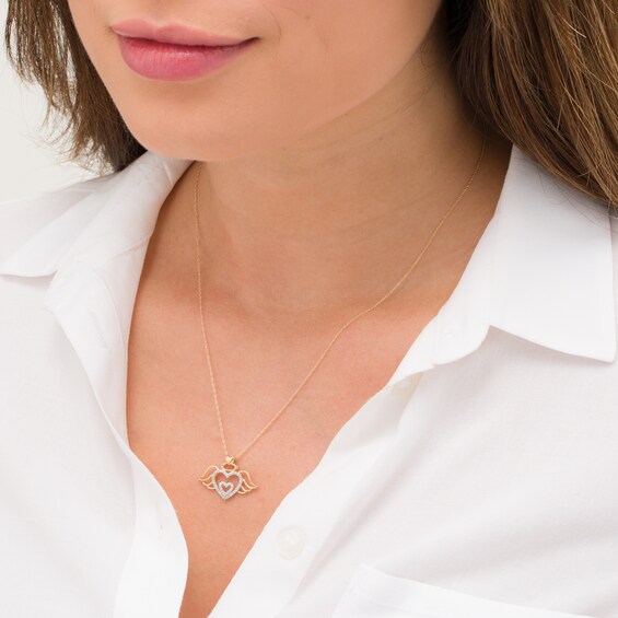 1/10 CT. T.w. Diamond Angel Heart Pendant in 10K Gold