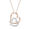 Thumbnail Image 1 of 1/6 CT. T.W. Diamond Tilted Double Heart Pendant in 10K Two-Tone Gold