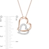 Thumbnail Image 3 of 1/6 CT. T.W. Diamond Tilted Double Heart Pendant in 10K Two-Tone Gold