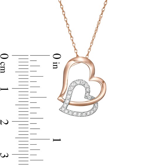 1/6 CT. T.w. Diamond Tilted Double Heart Pendant in 10K Two-Tone Gold