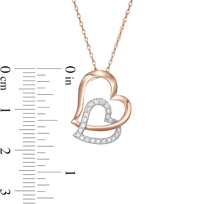 Main Image 3 of 1/6 CT. T.W. Diamond Tilted Double Heart Pendant in 10K Two-Tone Gold