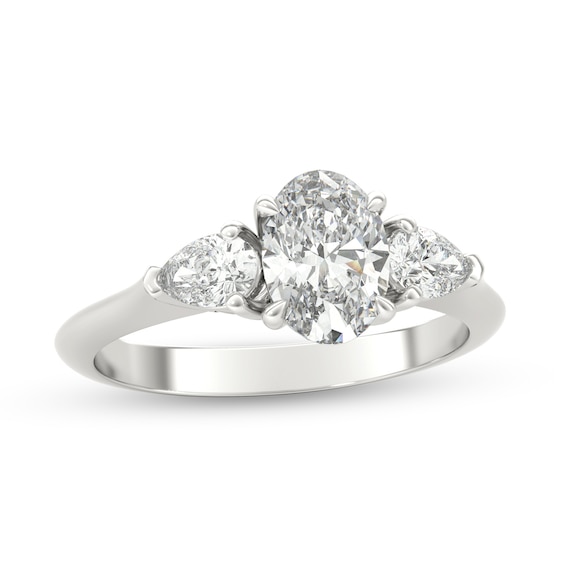 1 CT. T.W. Oval and Pear-Shaped Diamond Three Stone Engagement Ring in Platinum 1 CT. T.W. Oval and Pear-Shaped Diamond Three Stone Engagement Ring in Platinum