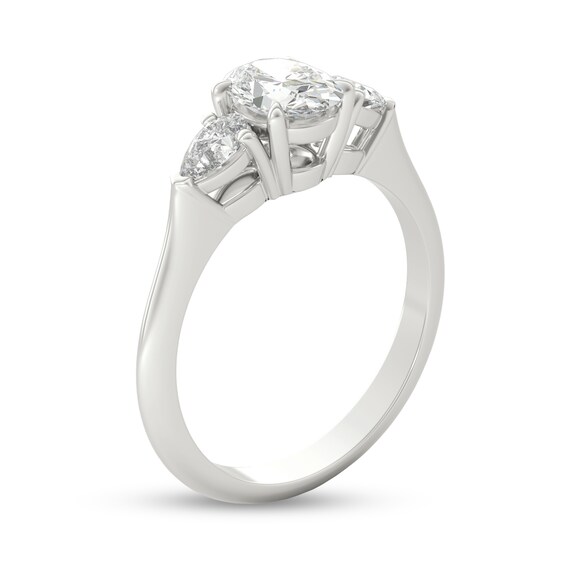 1 CT. T.W. Oval and Pear-Shaped Diamond Three Stone Engagement Ring in Platinum 1 CT. T.W. Oval and Pear-Shaped Diamond Three Stone Engagement Ring in Platinum