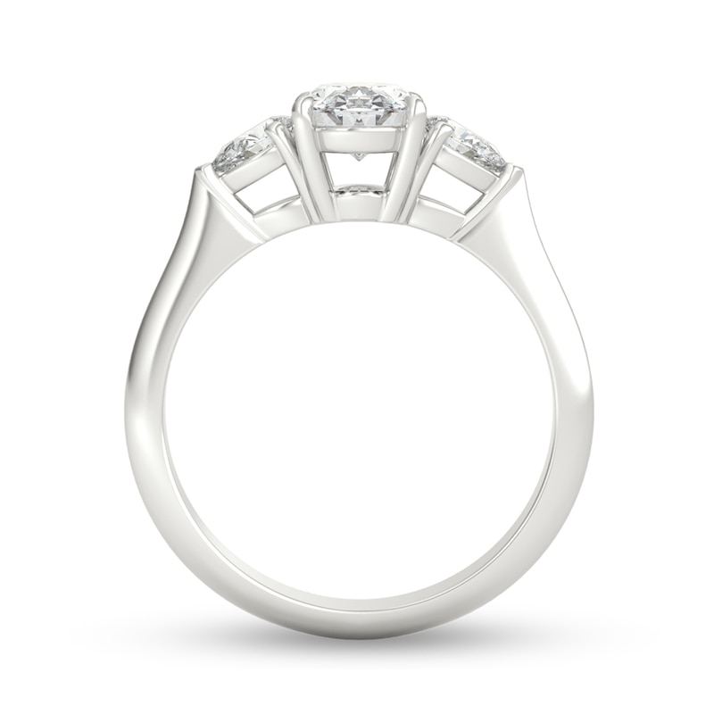 1-1/3 CT. T.W. Oval and Pear-Shaped Diamond Three Stone Engagement Ring in Platinum