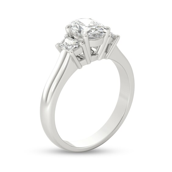 1-1/3 CT. T.W. Oval and Trapeze-Cut Diamond Three Stone Engagement Ring in Platinum 1-1/3 CT. T.W. Oval and Trapeze-Cut Diamond Three Stone Engagement Ring in Platinum