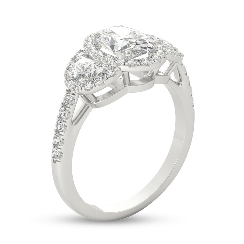 1-3/4 CT. T.W. Oval and Half-Moon-Shaped Diamond Frame Three Stone Engagement Ring in Platinum