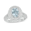 Thumbnail Image 1 of Oval Aquamarine and 5/8 CT. T.W. Diamond Double Frame Vintage-Style Engagement Ring in 14K White Gold