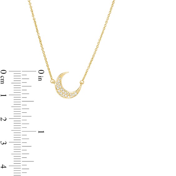 1/6 CT. T.w. Diamond Crescent Moon and Star Necklace in 10K Gold
