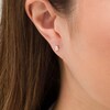 Thumbnail Image 2 of 1/4 CT. T.W. Emerald-Cut Diamond Solitaire Stud Earrings in 10K White Gold (I/I2)